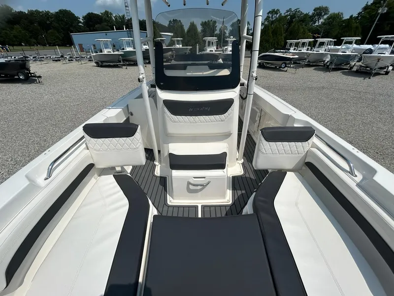 Slide: The Image of 2022 Bayliner Trophy T20CX boat interior with seating and console. - 3