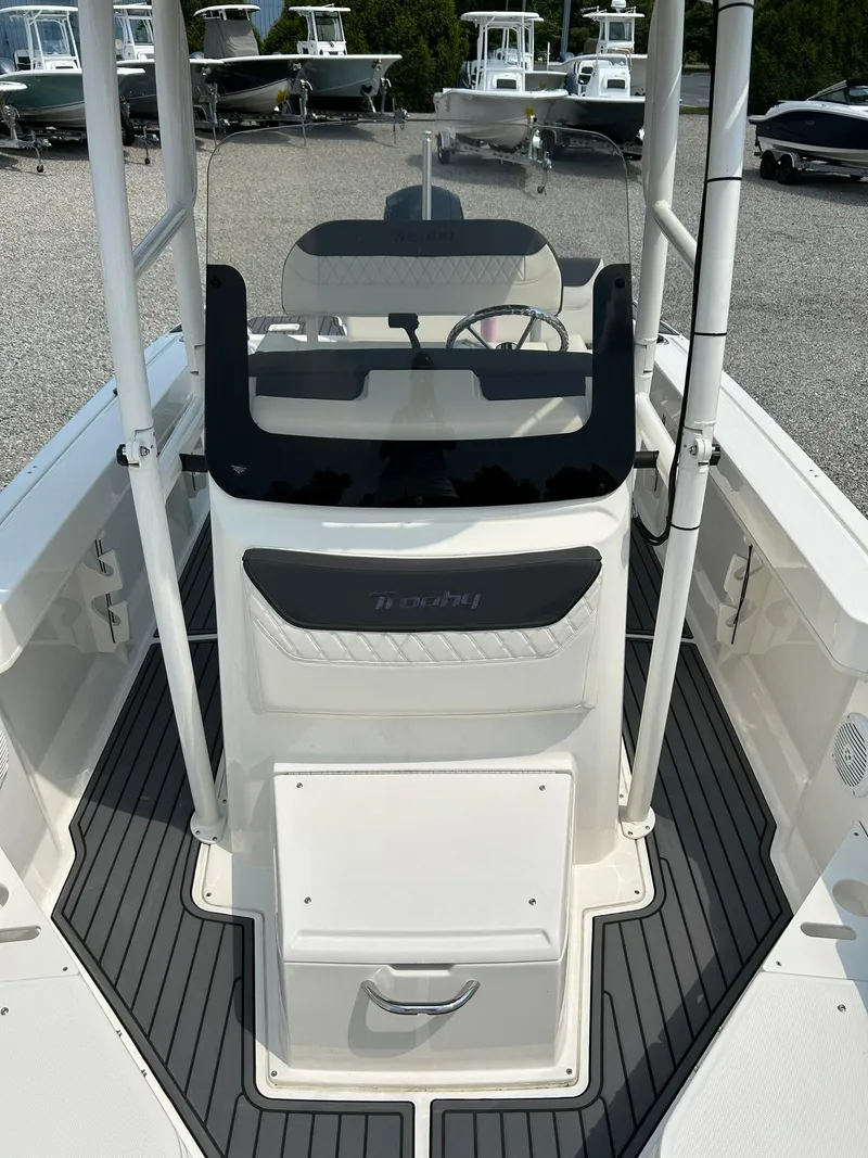 Slide: The Image of 2022 Bayliner Trophy T20CX boat interior with sleek console and seating. - 8