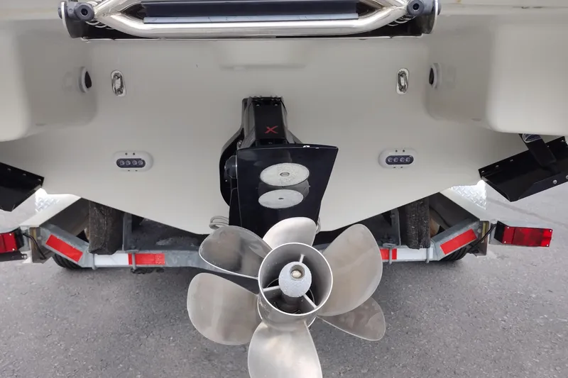 Slide: The Image of Rear view of 2016 Formula 270 Bowrider boat with propeller and trailer. - 14