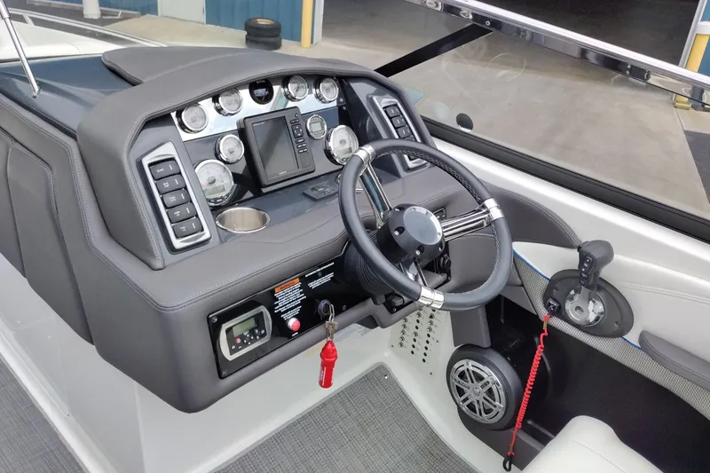 Slide: The Image of 2016 Formula 270 Bowrider dashboard with steering wheel and control panel. - 18