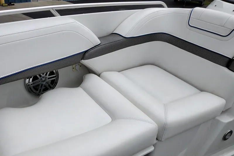 Slide: The Image of 2016 Formula 270 Bowrider interior with white cushioned seating and speaker detail. - 20