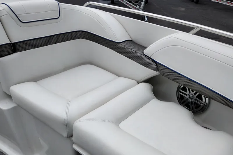 Slide: The Image of 2016 Formula 270 Bowrider interior with white cushioned seating and speaker detail. - 21