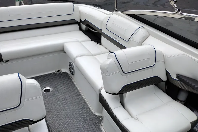 Slide: The Image of 2016 Formula 270 Bowrider interior with white cushioned seating and sleek design. - 23