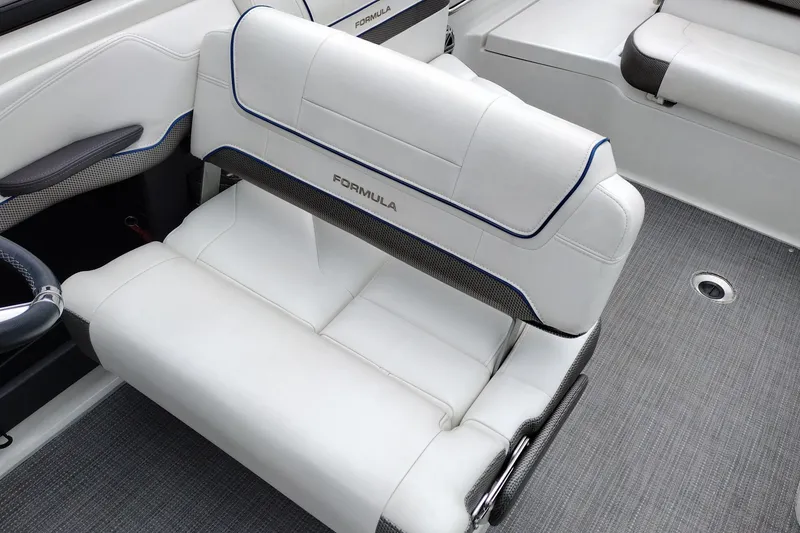 Slide: The Image of 2016 Formula 270 Bowrider interior with white seating and modern design. - 24