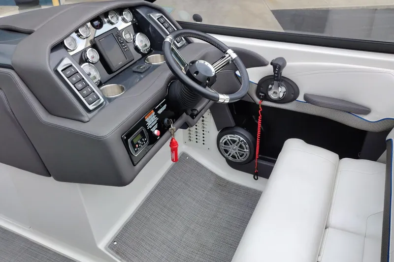 Slide: The Image of 2016 Formula 270 Bowrider dashboard with steering wheel and control panel. - 25