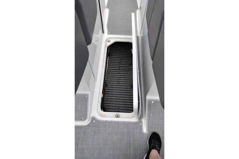 Slide: The Image of 2016 Formula 270 Bowrider interior storage compartment with open hatch and visible flooring. - 39