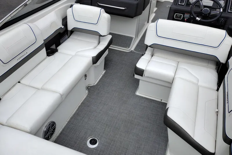 Slide: The Image of 2016 Formula 270 Bowrider interior with white seating and modern design. - 40