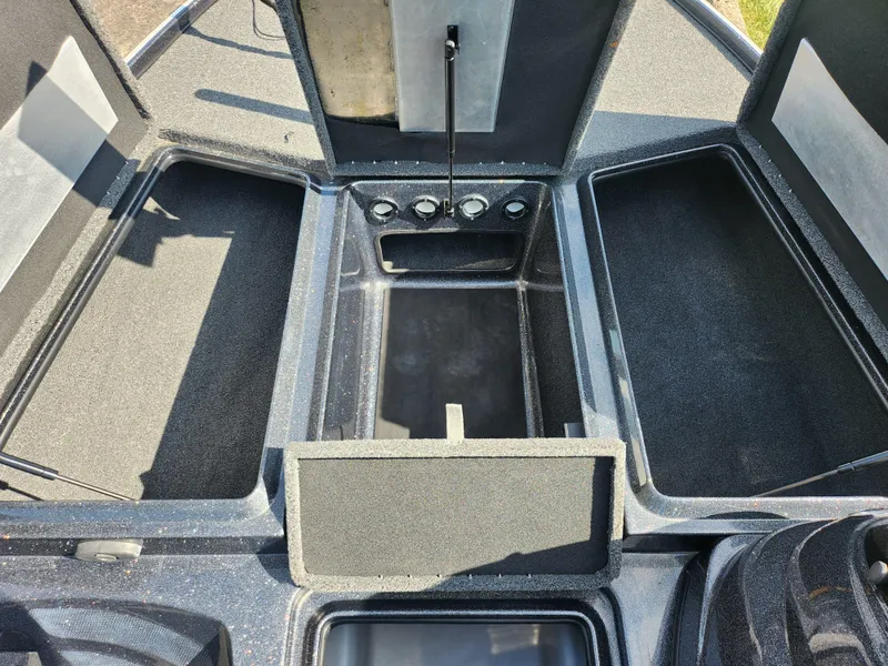 Slide: The Image of 2021 Nitro Z17 boat storage compartments, open and empty, showcasing spacious interior design. - 15