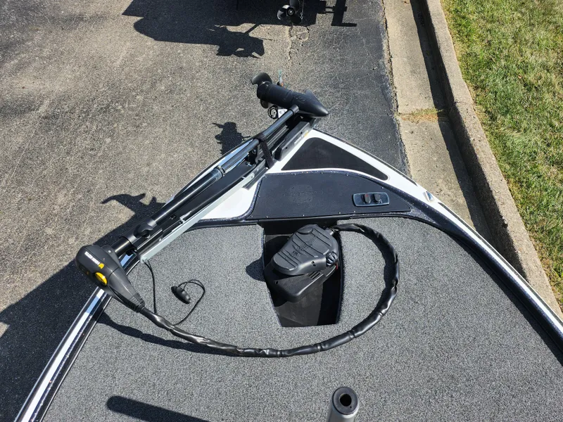 Slide: The Image of 2021 Nitro Z17 boat deck with trolling motor and storage compartment. - 16