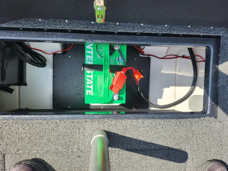 Slide: The Image of Battery compartment of a 2021 Nitro Z17 boat with Interstate battery. - 23