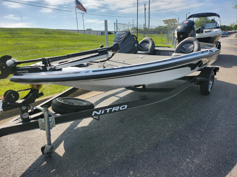 Slide: The Image of 2021 Nitro Z17 fishing boat on trailer, parked outdoors. - 6