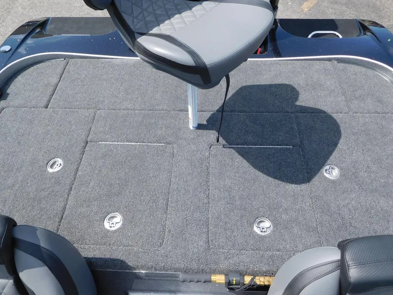 Slide: The Image of 2025 Caymas CX 21 PRO boat deck with seating and storage compartments. - 10