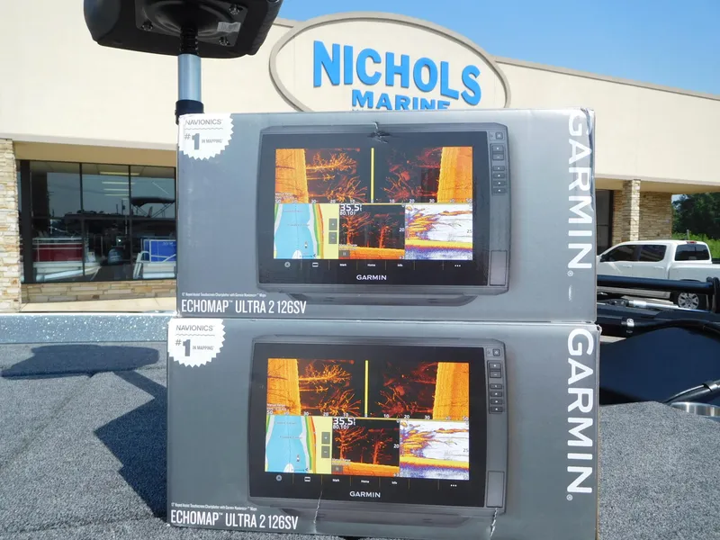 Slide: The Image of Garmin ECHOMAP Ultra 126sv boxes at Nichols Marine, Caymas CX 21 PRO, 2025 model. - 3