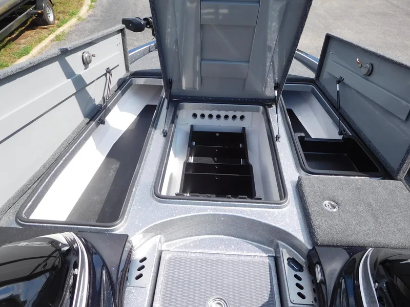 Slide: The Image of 2025 Caymas CX 21 PRO boat storage compartments open, showcasing spacious interior design. - 6