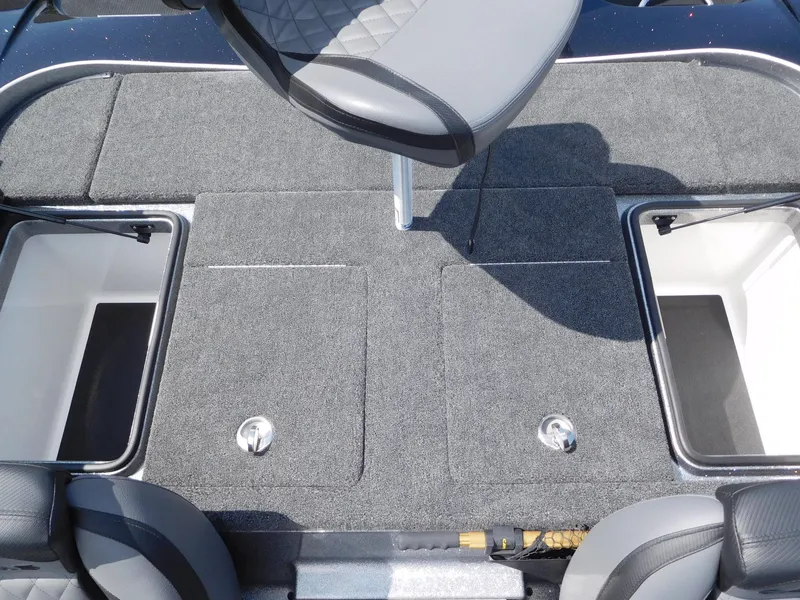 Slide: The Image of 2025 Caymas CX 21 PRO boat interior with storage compartments and seating. - 7