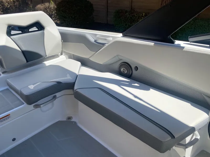 Slide: The Image of 2025 Scarab 235 SE boat interior with sleek seating and modern design. - 17