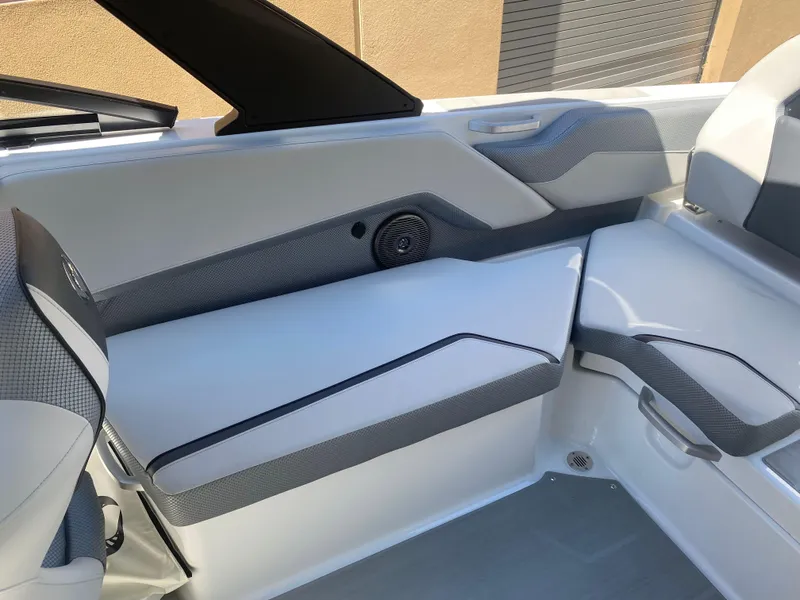Slide: The Image of Interior of 2025 Scarab 235 SE boat, featuring sleek seating and modern design. - 18