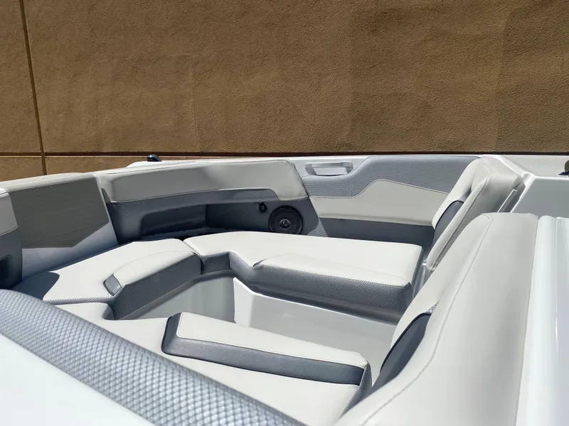 Slide: The Image of 2025 Scarab 235 SE boat interior with modern seating and sleek design. - 4