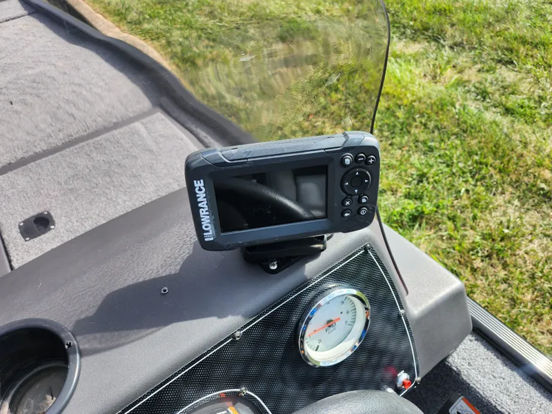 Slide: The Image of Lowrance fish finder on 2022 Tracker Bass Tracker Classic XL dashboard. - 13