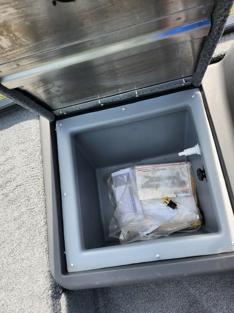 Slide: The Image of Open storage compartment in 2022 Tracker Bass Tracker Classic XL boat. - 15