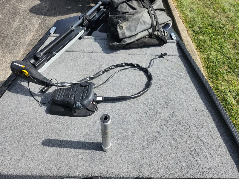 Slide: The Image of 2022 Tracker Bass Tracker Classic XL boat deck with fishing gear and equipment. - 16