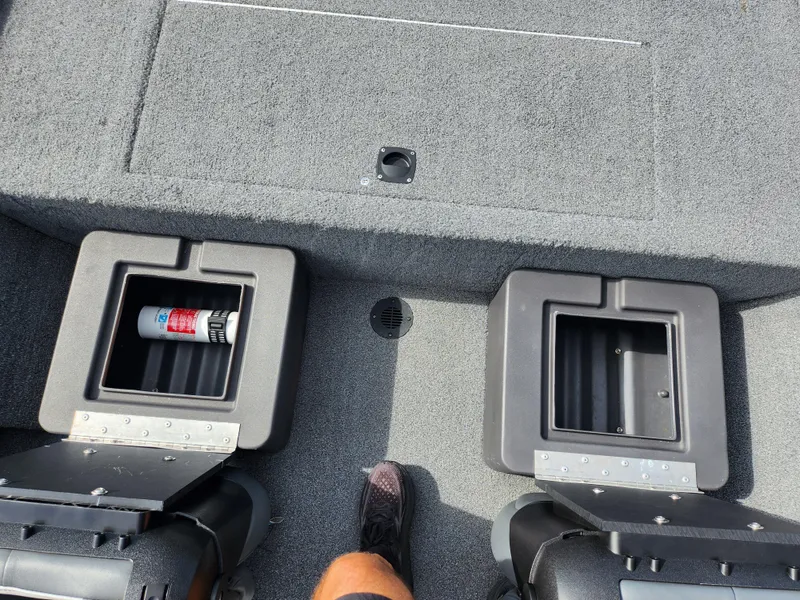 Slide: The Image of 2022 Tracker Bass Tracker Classic XL boat interior with storage compartments. - 20