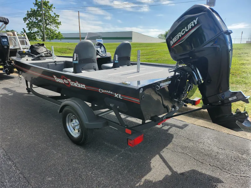 Slide: The Image of 2022 Tracker Bass Tracker Classic XL boat with Mercury outboard motor on trailer. - 3