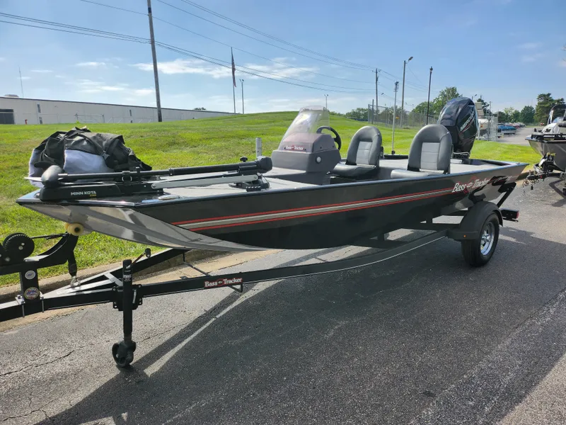 Slide: The Image of 2022 Tracker Bass Tracker Classic XL fishing boat on trailer, parked outdoors. - 5