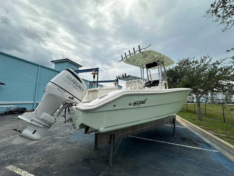 Slide: The Image of 2025 Bulls Bay 230 CC boat with Suzuki outboard motor on display. - 3