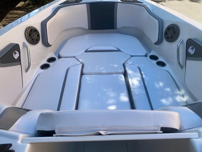 Slide: The Image of 2025 Scarab 255 ID boat interior with sleek seating and modern design. - 10