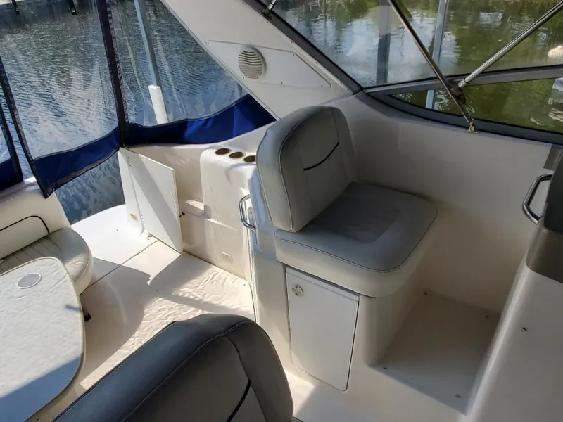 Slide: The Image of Interior of 2000 Bayliner 3055 Ciera Sunbridge DX/LX boat with seating and windows. - 6