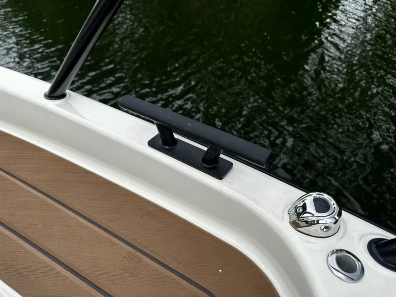 Slide: The Image of 2024 Navan S30 boat deck with cleat and water view. - 36