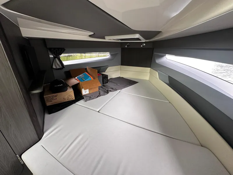 Slide: The Image of 2024 Navan S30 interior cabin with modern design and storage boxes. - 43