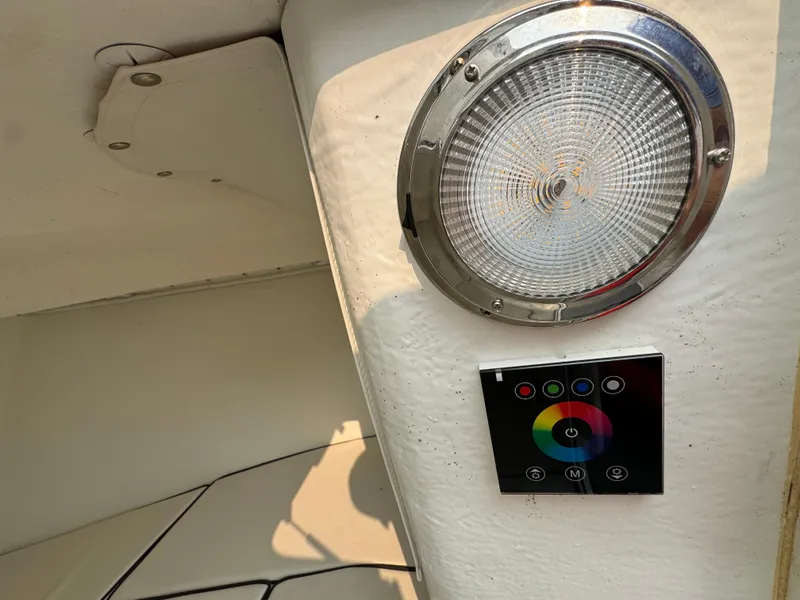 Slide: The Image of LED light and control panel on 2019 Eastern 21 Pilot boat interior. - 21