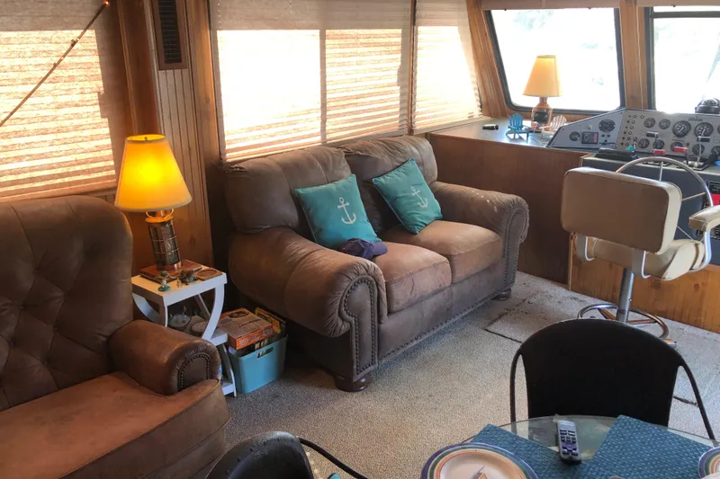 Slide: The Image of Cozy interior of a 1994 Gibson 50 Cabin Yacht with plush seating and nautical decor. - 30
