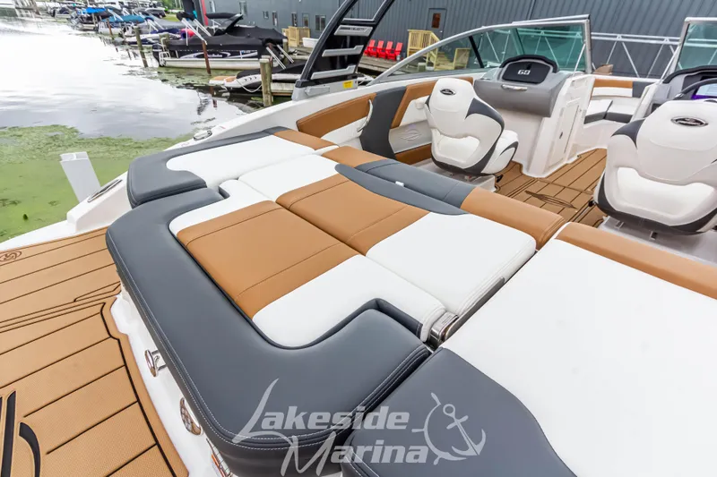 Slide: The Image of 2025 Chaparral 21 SSi boat interior with luxurious seating at Lakeside Marina. - 12