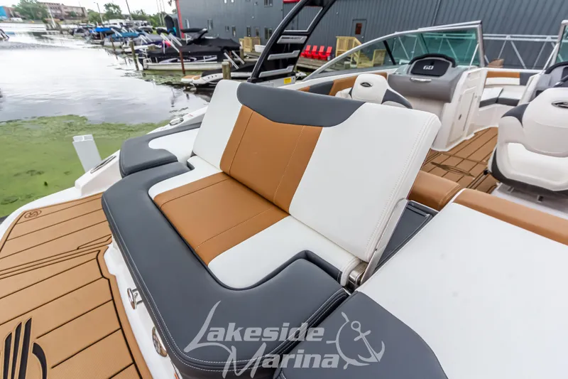 Slide: The Image of 2025 Chaparral 21 SSi boat interior with stylish seating at Lakeside Marina. - 13