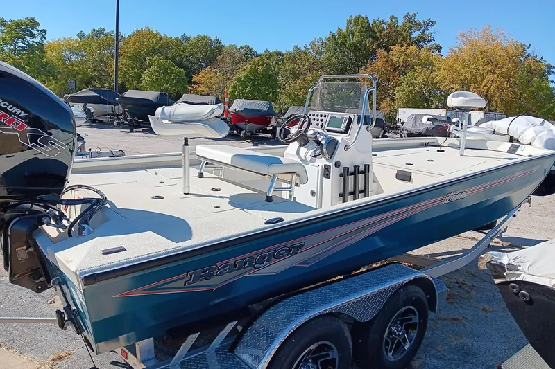 The Image of 2024 Ranger RB200 boat on trailer in outdoor lot. - 0