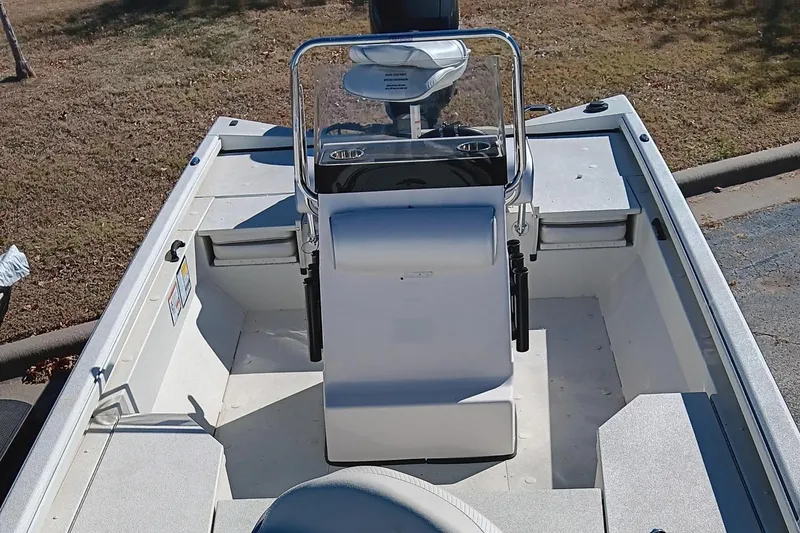 Slide: The Image of 2024 Ranger RB200 boat interior with steering console and seating. - 3