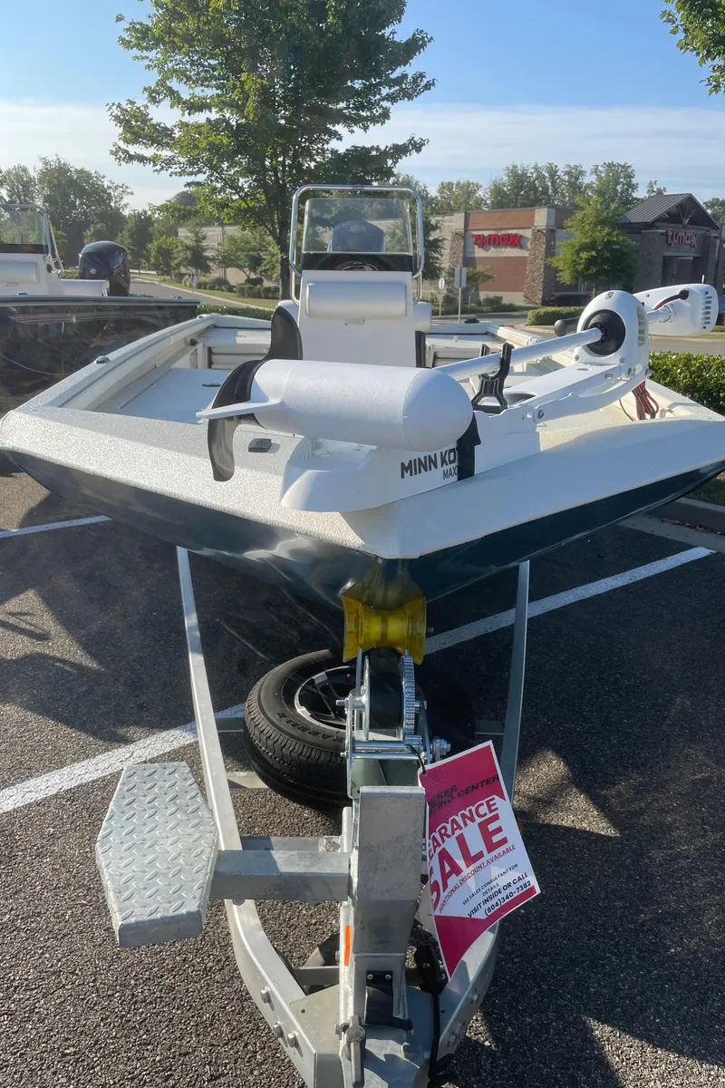 Slide: The Image of 2024 Ranger RB200 boat on clearance sale in parking lot. - 1