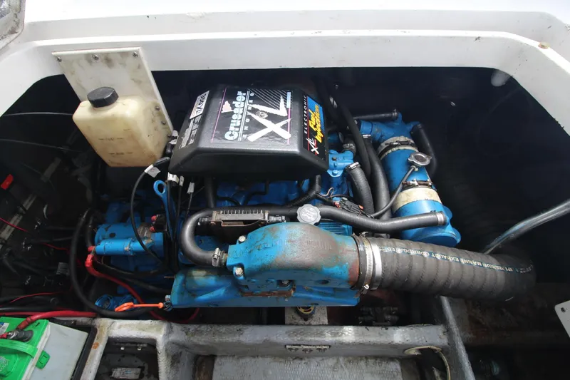 Slide: The Image of Engine compartment of a 1999 Mainship 31 Sedan Bridge with Crusader XL engine. - 45
