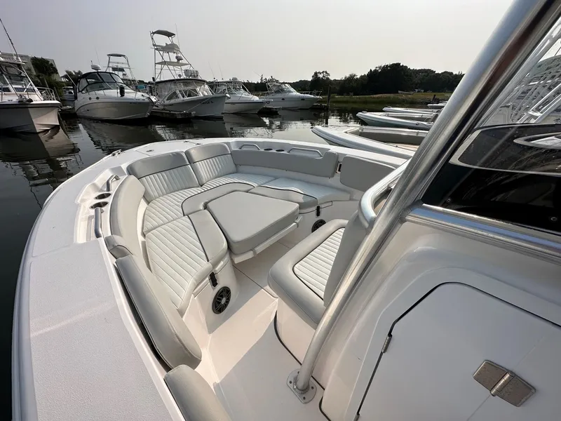 Slide: The Image of 2023 Sea Fox 228 Commander boat interior with cushioned seating and sleek design. - 8