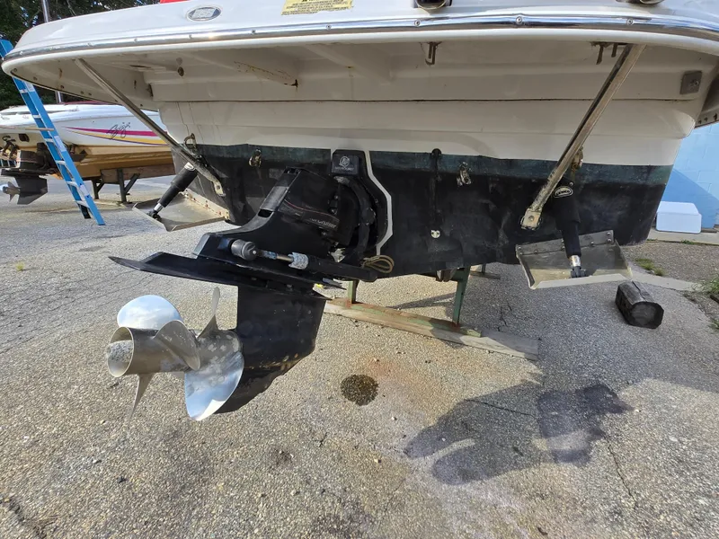 Slide: The Image of 2006 Crownline 255 CCR boat stern with propeller and outdrive visible. - 25