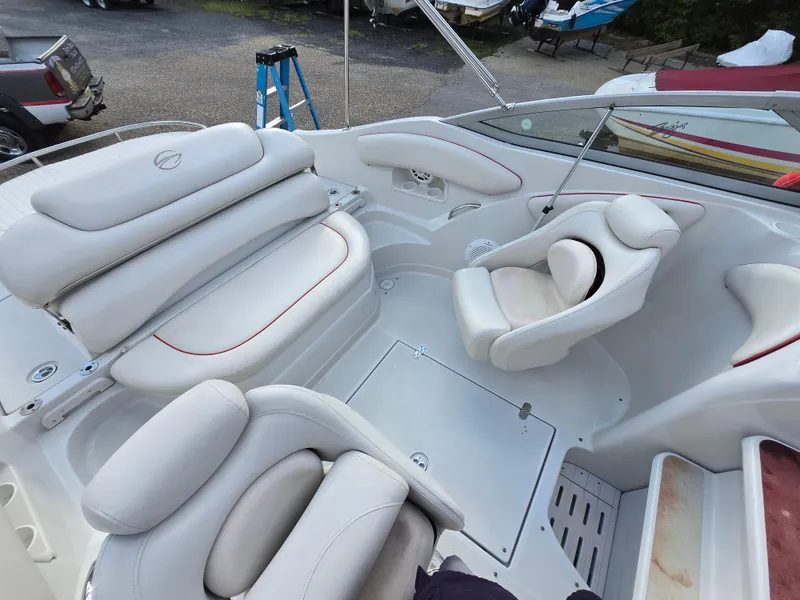 Slide: The Image of 2006 Crownline 255 CCR boat interior with white seating and modern design. - 29