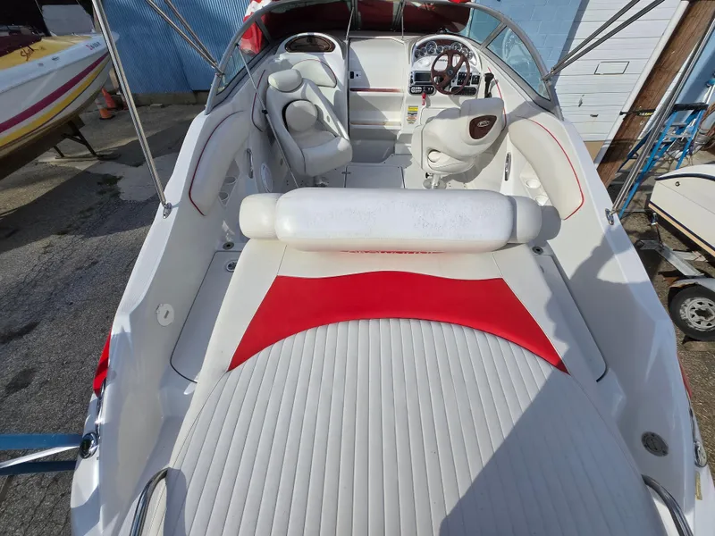 Slide: The Image of 2006 Crownline 255 CCR boat interior with white and red seating. - 4