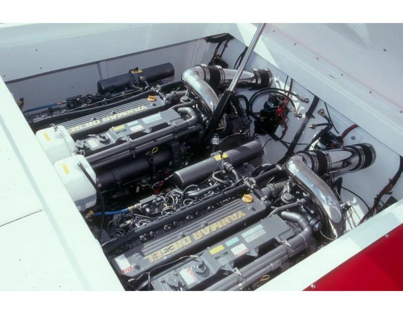 Slide: The Image of Twin Yanmar diesel engines in a 2004 Hustler 388 SLINGSHOT boat. - 5
