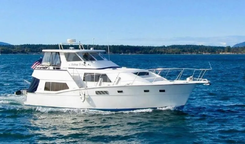 The Image of 1987 Kadey-Krogen Silhouette yacht cruising on a sunny day in open waters. - 0