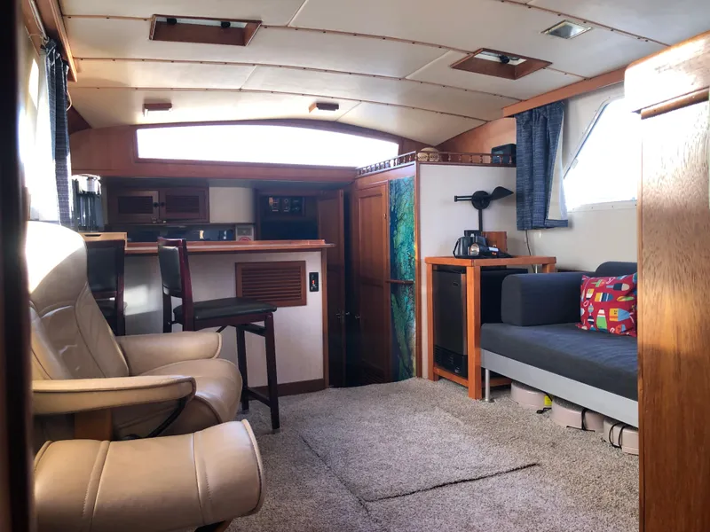 Slide: The Image of Interior of 1987 Kadey-Krogen Silhouette yacht with cozy seating and modern amenities. - 2
