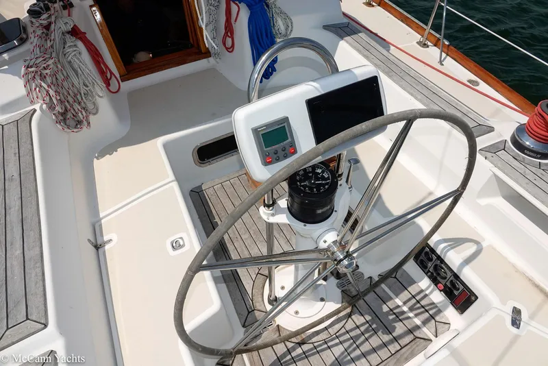 Slide: The Image of Steering wheel and navigation equipment on 2002 Tartan 3700 yacht deck. - 45