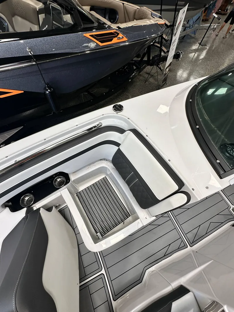 Slide: The Image of 2024 Monterey M6 boat interior with sleek seating and modern design. - 11